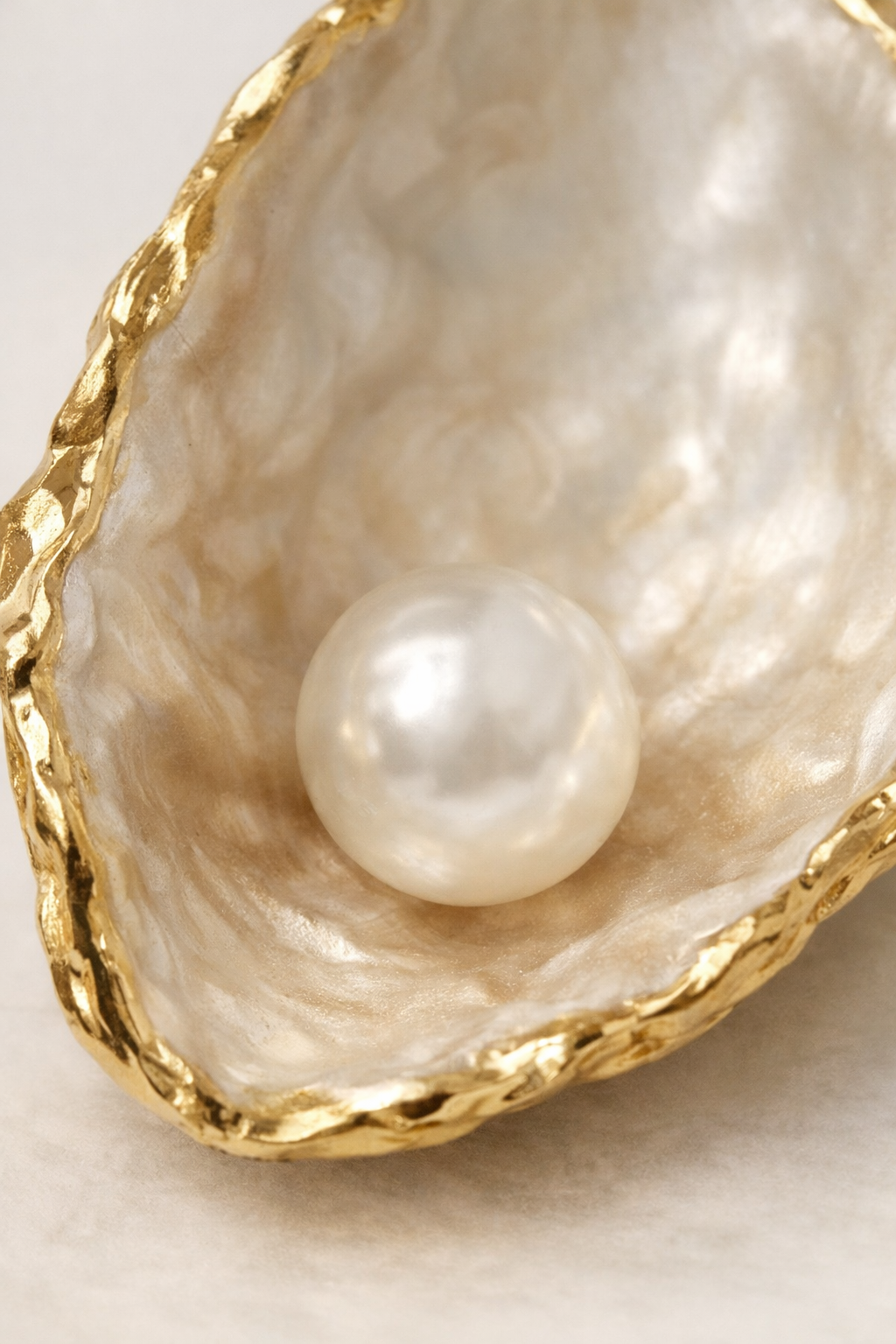 Pearl resting in an oyster shell